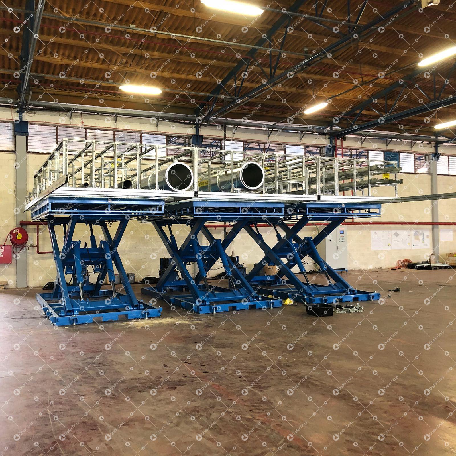 8 Unit Lifting Tables working with simultaneously lifting system.